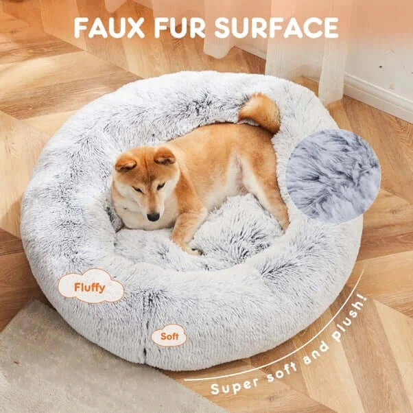 Heat-retaining shag fabric close-up on the Calm-Cloud™ plush donut dog bed for senior dogs