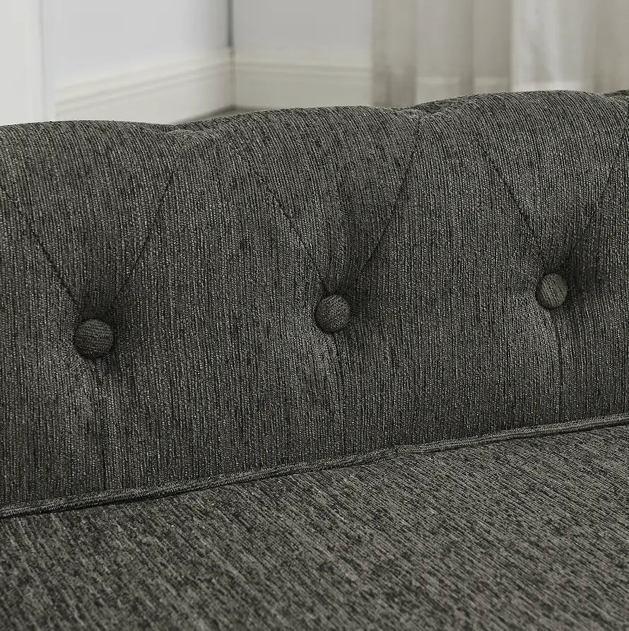 Close-up of the durable tufted dark grey fabric