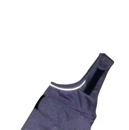 Close-up of the neck strap and reflective strip on the Wagisk calming wrap for dogs