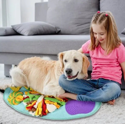 Snuffle mat for small dogs used by a Golden Retriever with a young girl in a living room